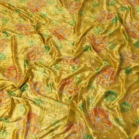 Bumblebee yellow Rayon velvet fabric with gold yellow and green print having yellow and white stone work in floral design