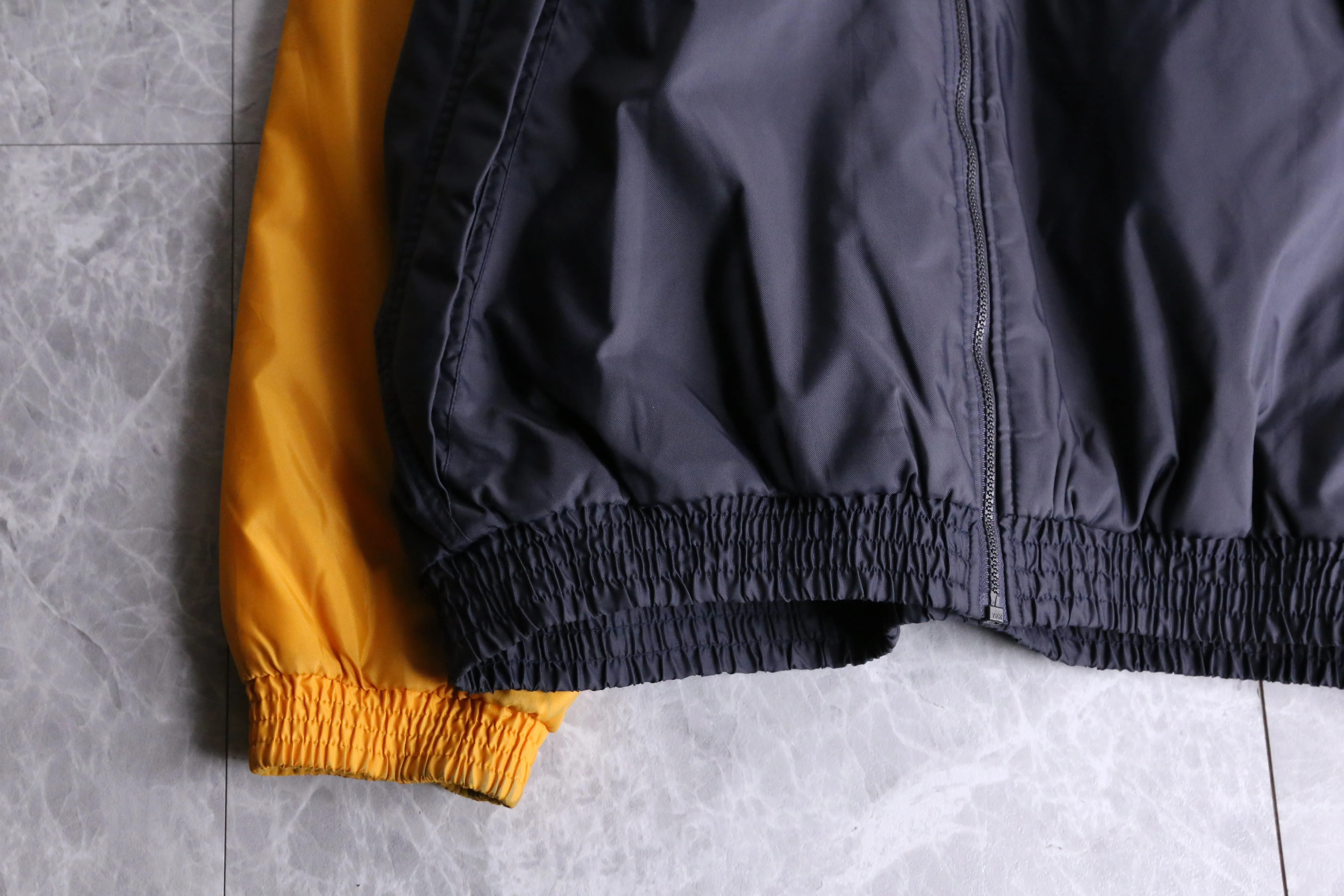 "NIKE" bi-color nylon track jacket